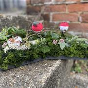 Robin Floral Tribute on Log