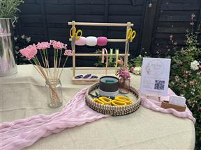 Floristry tools ribbons and decorative accessories at a Bloom Bar party
